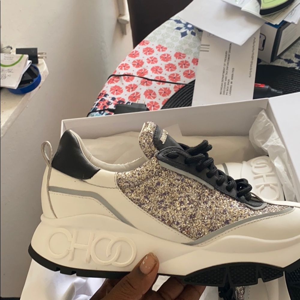 Selling new jimmy Choo sneakers they are to tight